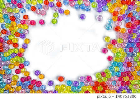 Background of colored beads on a white background Background of colored beads on a white background 140753800