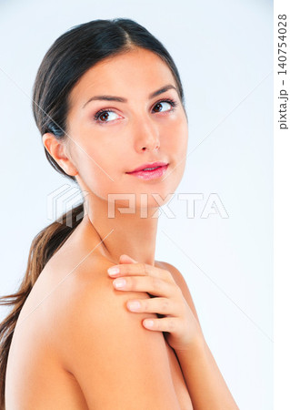 Thinking, woman and natural beauty with skincare, wellness and glow with dermatology on white background. Cosmetics, self care and touching skin with shine, treatment and moisturizer in studio Thinking, woman and natural beauty with skincare, wellness and glow with dermatology on white background. Cosmetics, self care and touching skin with shine, treatment and moisturizer in studio 140754028