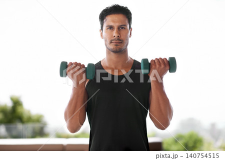 Portrait, dumbbell and serious man outdoor for training, exercise and sports to workout for power. Bodybuilder, face or strong person weightlifting for fitness, health or wellness in nature in Brazil 140754515