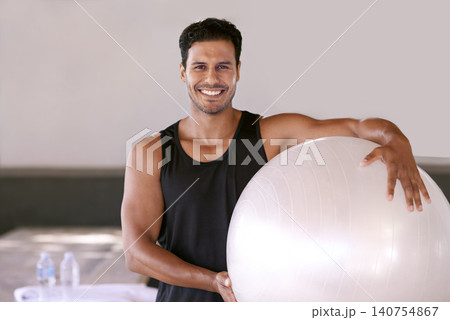 Portrait, happy man and pilates ball for exercise, workout or training in gym for healthy body in Brazil. Face, smile and person with equipment for sport, wellness or fitness for physical activity Portrait, happy man and pilates ball for exercise, workout or training in gym for healthy body in Brazil. Face, smile and person with equipment for sport, wellness or fitness for physical activity 140754867