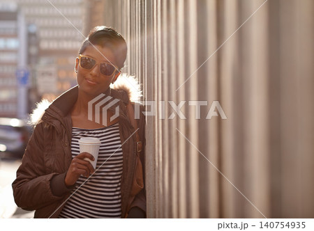 Street, fashion and portrait of woman with coffee, outdoor and happy, sunglasses and city. Adult, female person and girl with smile with jacket or coat in Cape Town, shades and tea to drink on hand Street, fashion and portrait of woman with coffee, outdoor and happy, sunglasses and city. Adult, female person and girl with smile with jacket or coat in Cape Town, shades and tea to drink on hand 140754935