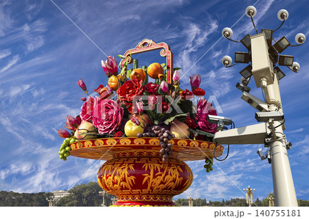 Street lamp and huge flower basket (against the background of a beautiful sky with clouds) in Tiananmen square, Beijing, China 140755181