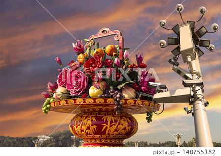 Street lamp and huge flower basket (against the sunset) in Tiananmen square, Beijing, China 140755182