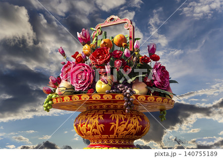 Huge flower basket (against the background of a beautiful sky with clouds) in Tiananmen square, Beijing, China Huge flower basket (against the background of a beautiful sky with clouds) in Tiananmen square, Beijing, China 140755189