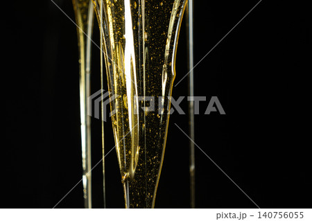 Macro Texture Of Liquid Fresh Honey On Black Background. 140756055