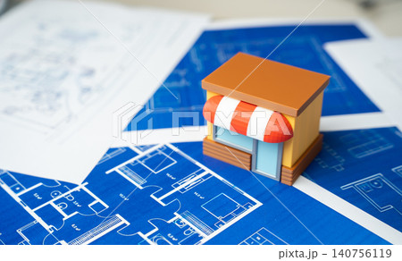 A store on blue drawings. Construction and expansion of a business and commercial real estate. Renovating stores. A store on blue drawings. Construction and expansion of a business and commercial real estate. Renovating stores. 140756119