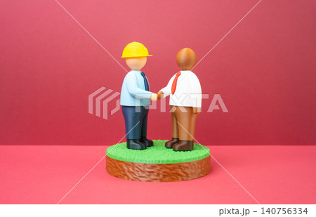 A businessman and a builder negotiate a land plot for construction. A contract is concluded for the construction of real estate and infrastructure. 140756334