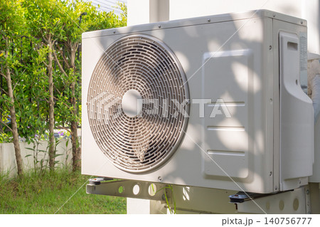 Air condition outdoor unit compressor install outside the house 140756777