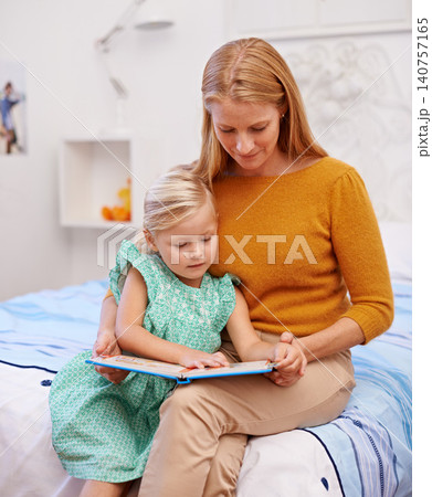 Mother, child and kids book for bed in bedroom at family home with fantasy story for development. Love, care and support of a mom with a young girl together with bonding and reading for education Mother, child and kids book for bed in bedroom at family home with fantasy story for development. Love, care and support of a mom with a young girl together with bonding and reading for education 140757165