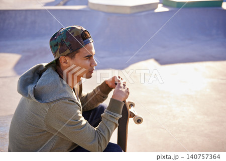 Thinking, skateboard and man at a skate park with idea for trick, stunt or adrenaline sports action. Planning, calm and male skateboarder with reflection, questions or memory while chilling on a ramp Thinking, skateboard and man at a skate park with idea for trick, stunt or adrenaline sports action. Planning, calm and male skateboarder with reflection, questions or memory while chilling on a ramp 140757364
