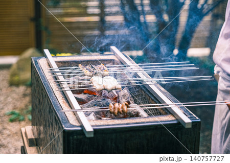 【#グルメ】炭火で焼くうなぎの蒲焼き 【#グルメ】炭火で焼くうなぎの蒲焼き 140757727
