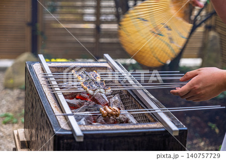 【#グルメ】炭火で焼くうなぎの蒲焼き 【#グルメ】炭火で焼くうなぎの蒲焼き 140757729