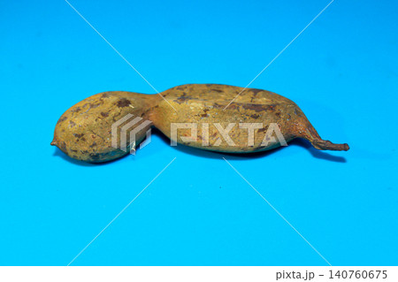 Tamarind Pod Isolated on Blue Background Tamarind Pod Isolated on Blue Background 140760675
