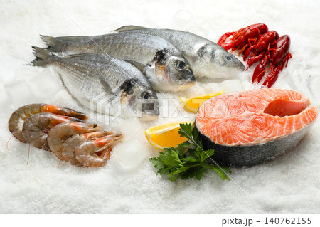 Fresh fish and different seafood on ice Fresh fish and different seafood on ice 140762155