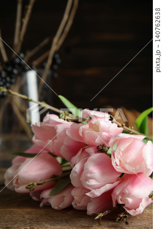 Beautiful bouquet of spring pink tulips on wooden table Beautiful bouquet of spring pink tulips on wooden table 140762638