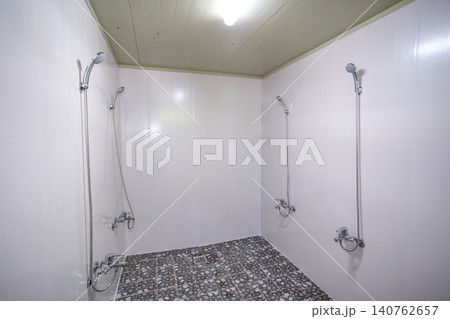 Interior of a Clean Communal Public Shower Room Facility Interior of a Clean Communal Public Shower Room Facility 140762657