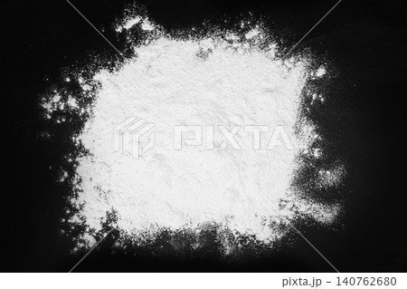 Pile of flour on black table, top view 140762680