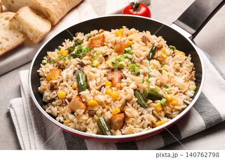 Delicious rice pilaf with vegetables on table Delicious rice pilaf with vegetables on table 140762798