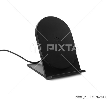 Black wireless charger isolated on white. Modern technology Black wireless charger isolated on white. Modern technology 140762814