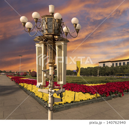 Street lamp on Tiananmen Square in Beijing, China (against the sunset), with propaganda or public announcement speakers Street lamp on Tiananmen Square in Beijing, China (against the sunset), with propaganda or public announcement speakers 140762940