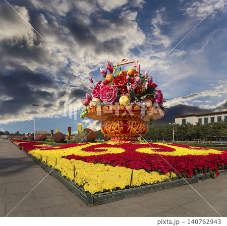 Huge flower basket (against the background of a beautiful sky with clouds) in Tiananmen square, Beijing, China Huge flower basket (against the background of a beautiful sky with clouds) in Tiananmen square, Beijing, China 140762943