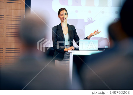 Business woman, talking and presentation with projector screen, conference or workshop with laptop for slideshow. Corporate training, seminar and speaker with info, audience and professional speech Business woman, talking and presentation with projector screen, conference or workshop with laptop for slideshow. Corporate training, seminar and speaker with info, audience and professional speech 140763208
