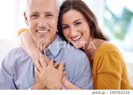 Couple, age difference and hug for love with unique relationship, portrait and support for trust at home. Senior man, young woman and marriage, commitment and loyalty with partner and pride together 140763210