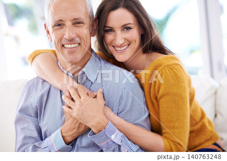 Happy couple, age difference and smile in portrait, love with unique relationship and support for trust at home. Senior man, young woman in marriage, commitment and loyalty with hug and pride Happy couple, age difference and smile in portrait, love with unique relationship and support for trust at home. Senior man, young woman in marriage, commitment and loyalty with hug and pride 140763248