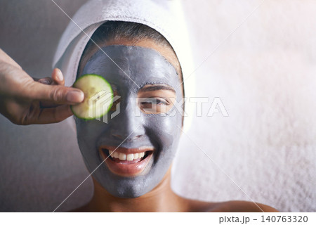 Woman, spa and cucumber mask portrait for product, skincare and cosmetic treatment for break or peace. Young person and natural for holistic therapy for facial, clean and hygiene for wellness Woman, spa and cucumber mask portrait for product, skincare and cosmetic treatment for break or peace. Young person and natural for holistic therapy for facial, clean and hygiene for wellness 140763320