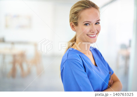 Nurse, arms crossed or portrait of a happy woman in hospital for medical, support or mockup space. Smile, healthcare and confident female surgeon nursing in clinic for wellness, medicine or treatment Nurse, arms crossed or portrait of a happy woman in hospital for medical, support or mockup space. Smile, healthcare and confident female surgeon nursing in clinic for wellness, medicine or treatment 140763325