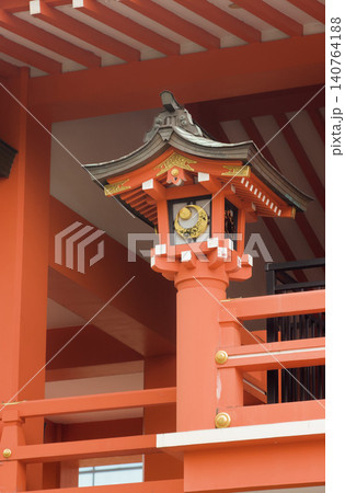 Detail of a lamp in a red and white Japanese temple. Detail of a lamp in a red and white Japanese temple. 140764188