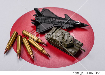 A fighter jet against the Japanese flag as a conceptual background representing defense A fighter jet against the Japanese flag as a conceptual background representing defense 140764556