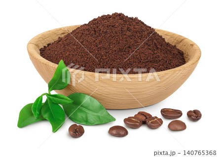 ground coffee in wooden bowl and coffee beans isolated on white background 140765368