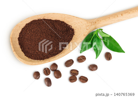 ground coffee in wooden spoon and coffee beans isolated on white background. Top view. Flat lay ground coffee in wooden spoon and coffee beans isolated on white background. Top view. Flat lay 140765369
