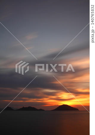 sunset on the beach. Seaside town of Turgutreis and spectacular sunsets. Selective Focus. Long Exposure shoot. tranquility scene. 140765832