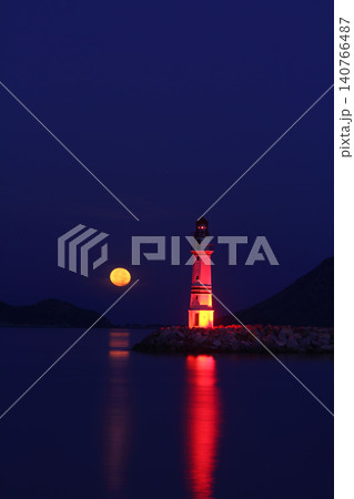 Seaside town of Turgutreis and spectacular sunsets. With full moon. Seaside town of Turgutreis and spectacular sunsets. With full moon. 140766487
