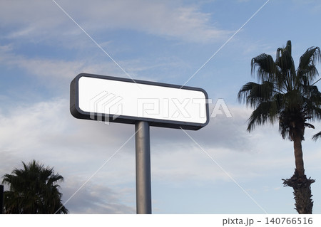 blank road sign on blue sky 140766516