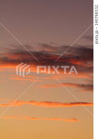 Dramatic red and orange sky and clouds abstract background. Red-orange clouds on sunset sky. Warm weather background. Art picture of sky at dusk Dramatic red and orange sky and clouds abstract background. Red-orange clouds on sunset sky. Warm weather background. Art picture of sky at dusk 140766532