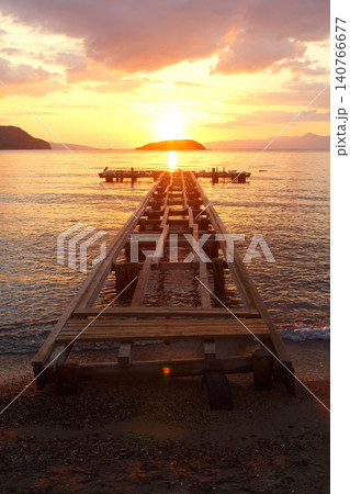 Old abandoned wooden fishing pier on the river in the countryside Old abandoned wooden fishing pier on the river in the countryside 140766677