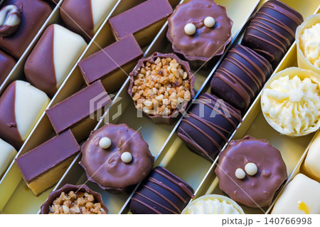 Chocolate cakes arranged in box Chocolate cakes arranged in box 140766998