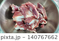 Fresh Raw Pork Ribs Cut into Pieces in a Stainless Steel Bowl 140767662