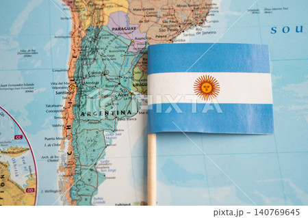 Bangkok, Thailand December 7, 2023, Argentina flag on world map background. Bangkok, Thailand December 7, 2023, Argentina flag on world map background. 140769645