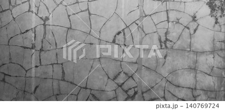 Cracked concrete wall texture with abstract worn plaster pattern and grunge style surface background. 140769724