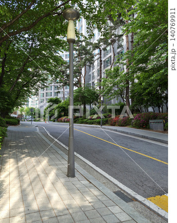 It is a road in an apartment complex. 140769911