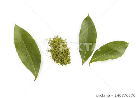 Fresh and dried bay leaves arranged with aromatic green powder. Herbal seasoning concept, PNG Fresh and dried bay leaves arranged with aromatic green powder. Herbal seasoning concept, PNG 140770570
