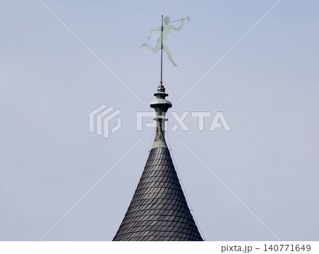 Quiet architectural form depiction. Stylized turret illustrating subtle sky and detailed roofing elements Quiet architectural form depiction. Stylized turret illustrating subtle sky and detailed roofing elements 140771649