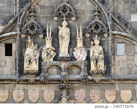 Historical stone carvings and heraldry. Heraldic shields embedded within classical stone carvings Historical stone carvings and heraldry. Heraldic shields embedded within classical stone carvings 140771676