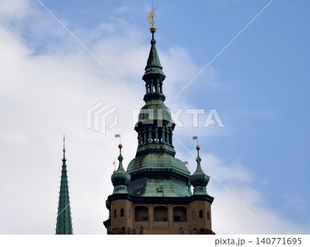 City skyline accentuated by dramatic slender turrets and pointed pinnacles reaching skyward City skyline accentuated by dramatic slender turrets and pointed pinnacles reaching skyward 140771695