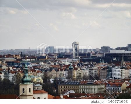 Bustling city horizon with sleek towers and layered red roofs highlighting architectural contrast Bustling city horizon with sleek towers and layered red roofs highlighting architectural contrast 140771698
