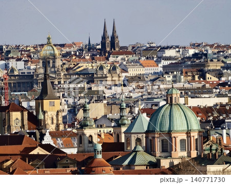 Ancient domes and spires present. City skyline accented by copper domes and decorative facades Ancient domes and spires present. City skyline accented by copper domes and decorative facades 140771730